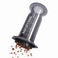 Original AeroPress coffee maker with coffee grounds