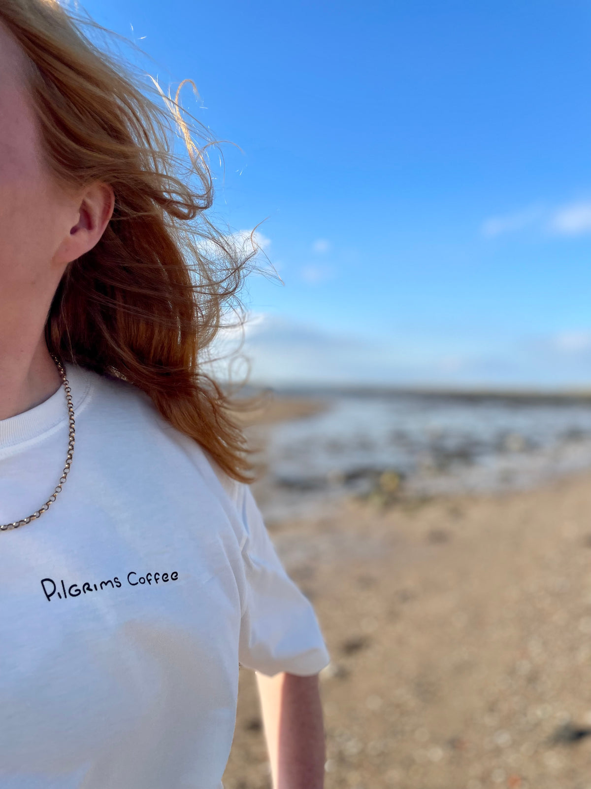 Pilgrims Coffee logo on the front of the organic cotton t-shirt
