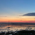 Sunset over the tidal flats at Holy Island of Lindisfarne